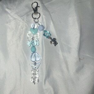 Charming pastel blue sea turtle keychain perfect for keys or bags!
